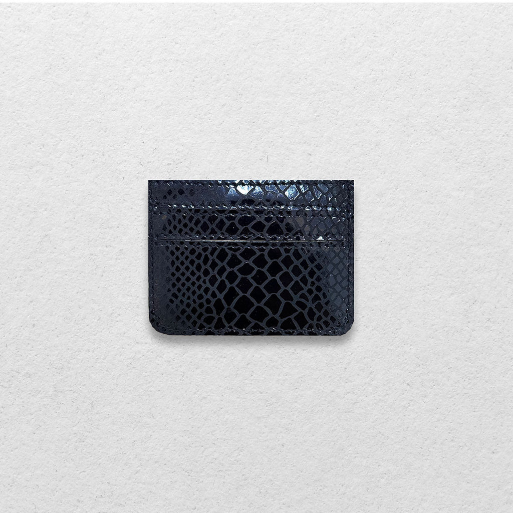 THE GENUINE CARDHOLDER
