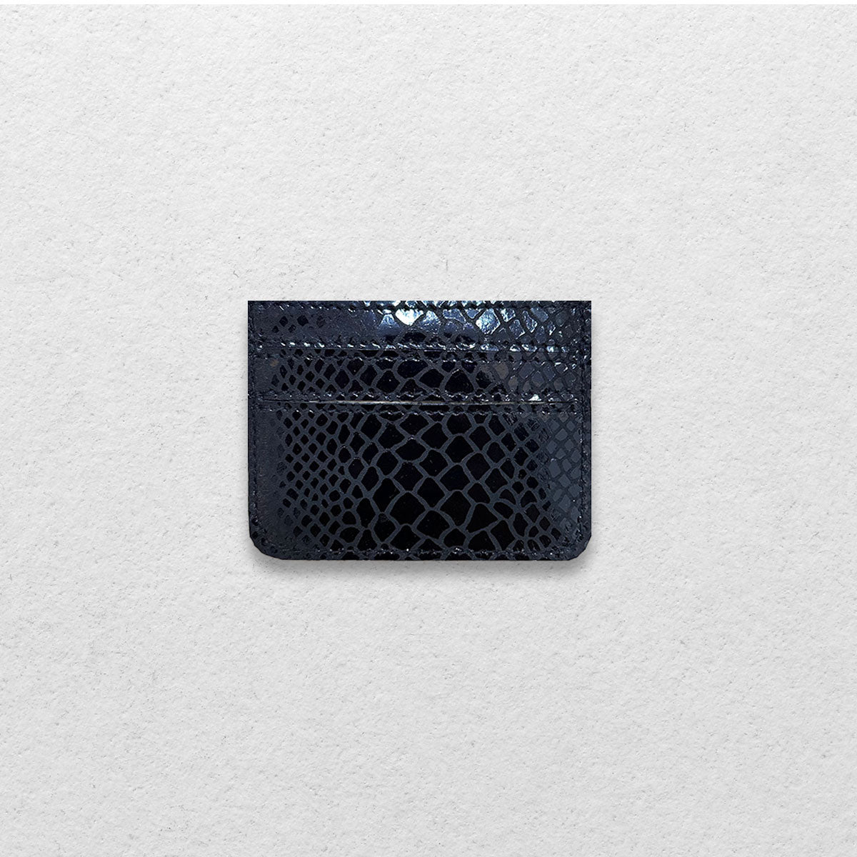 THE GENUINE CARDHOLDER