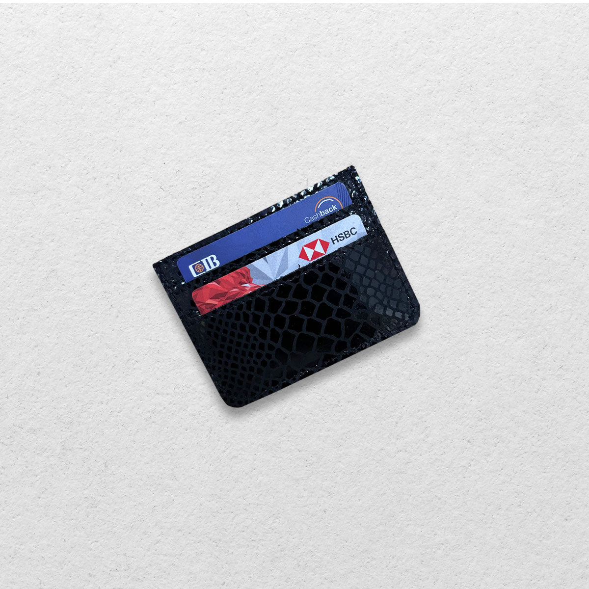 THE GENUINE CARDHOLDER