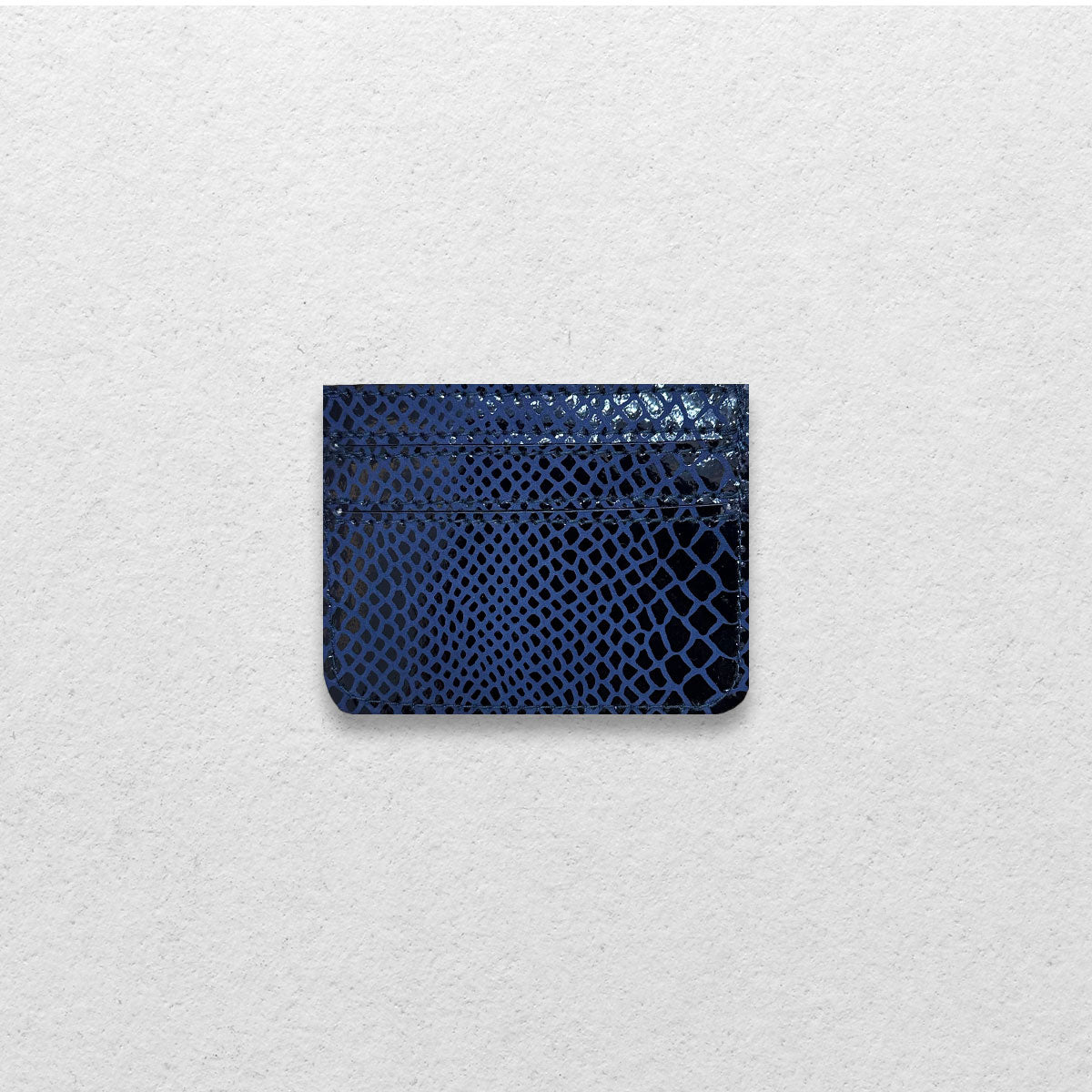 THE GENUINE CARDHOLDER