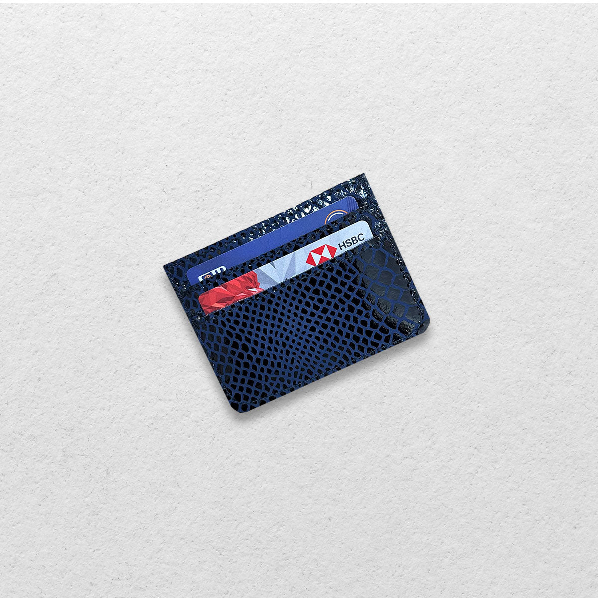 THE GENUINE CARDHOLDER