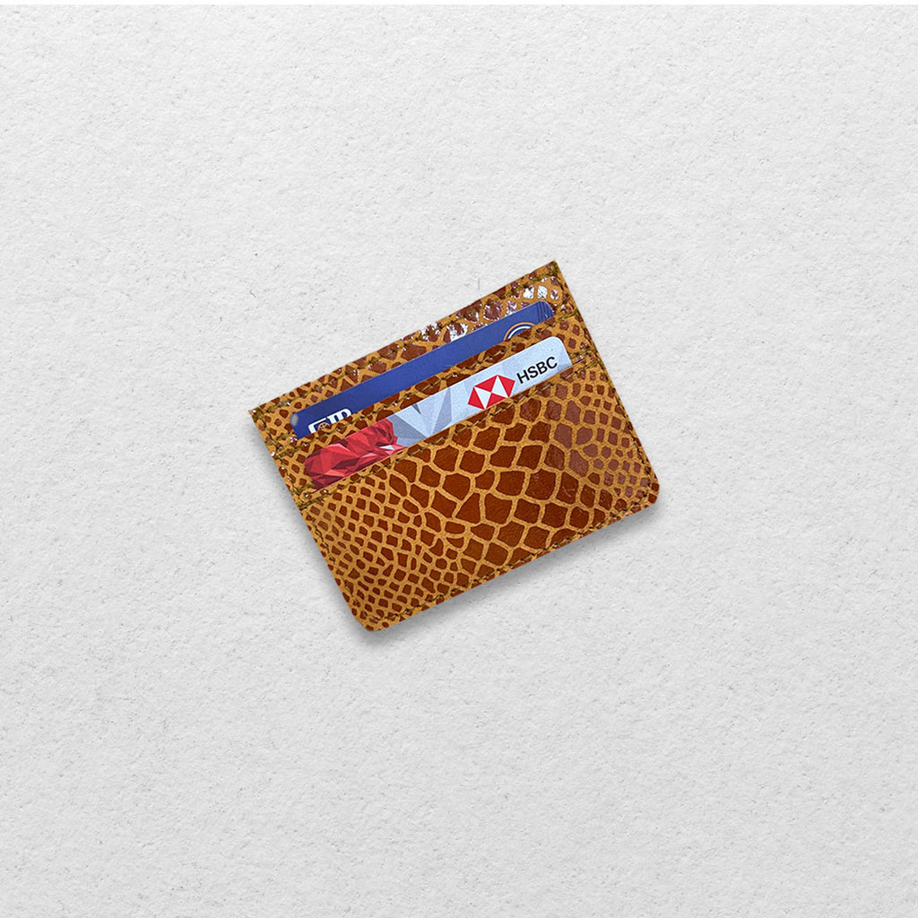 THE GENUINE CARDHOLDER