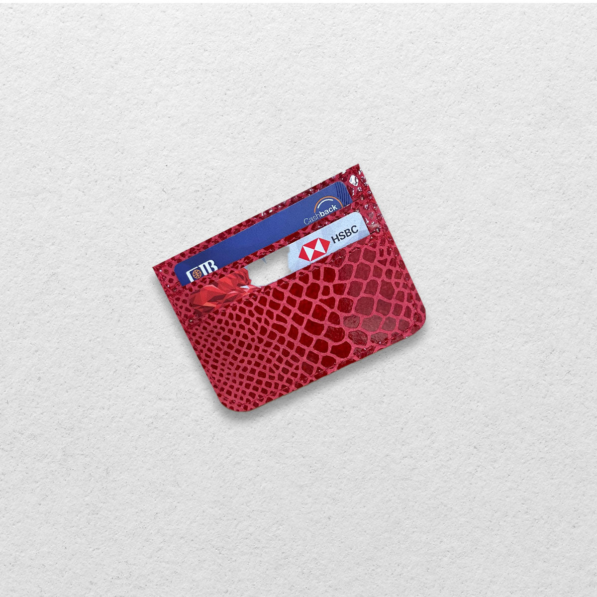 THE GENUINE CARDHOLDER