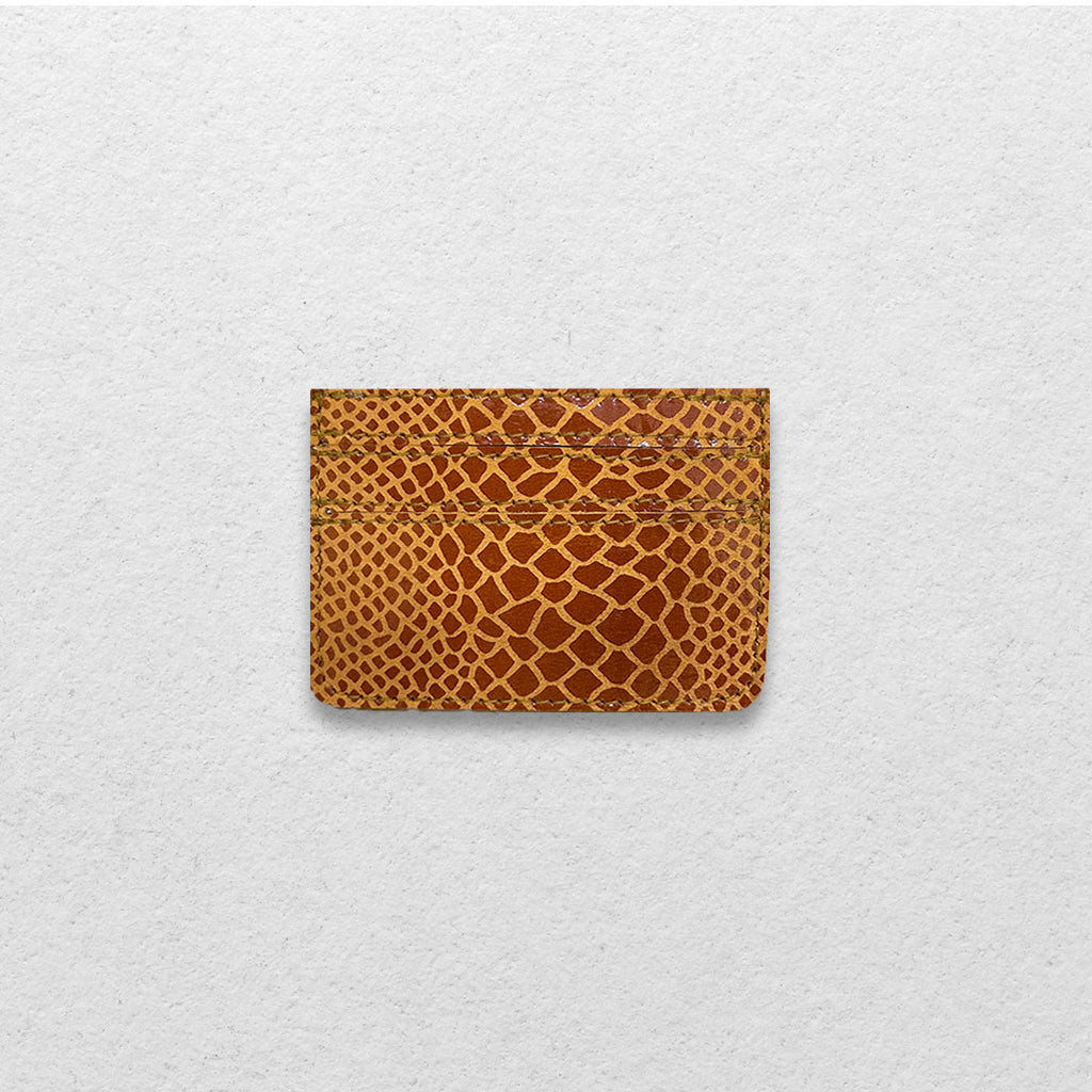 THE GENUINE CARDHOLDER