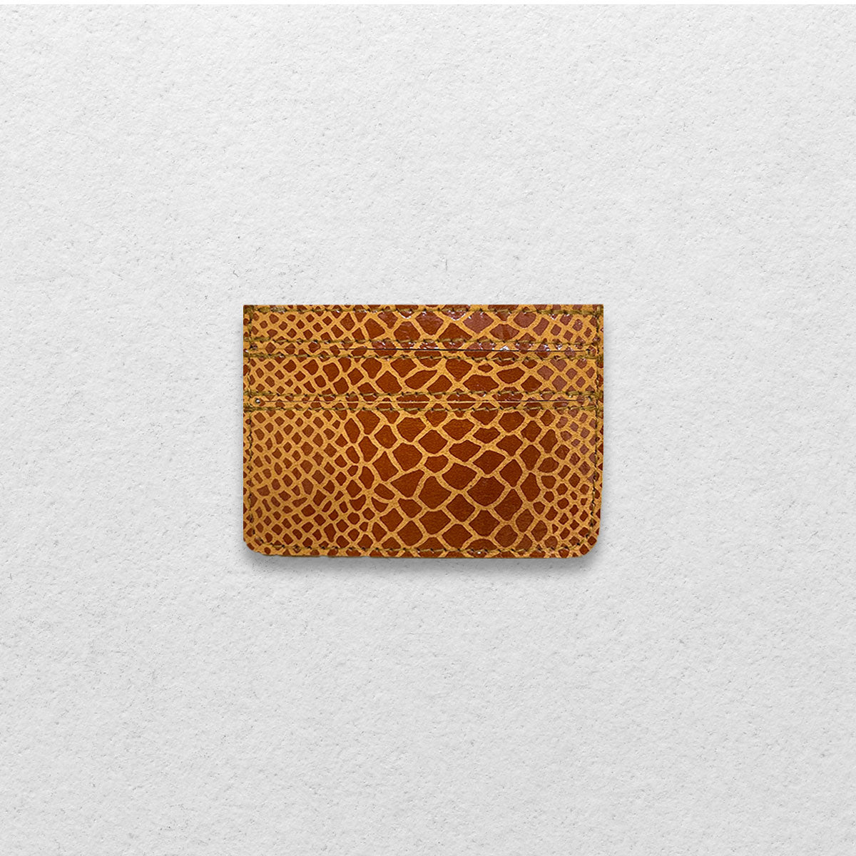THE GENUINE CARDHOLDER